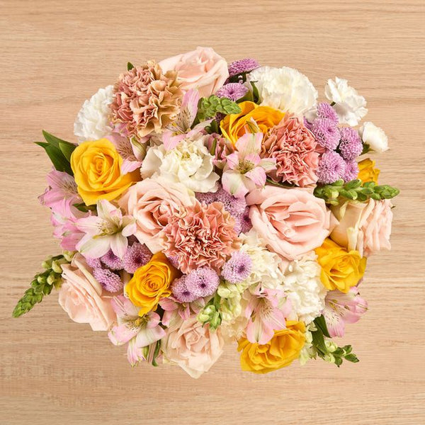 Bouquet Buttercream roses pêche jaunes carnations alstroemeria Maroc