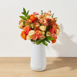 Bouquet Fleur d’Ambre – Roses Orange & Crème, Ranunculus – Bouquets.ma