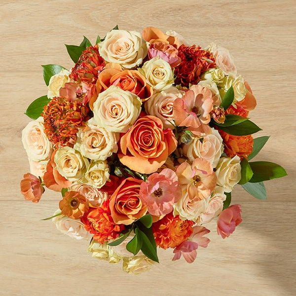 Bouquet Fleur d’Ambre – Roses Orange & Crème, Ranunculus – Bouquets.ma