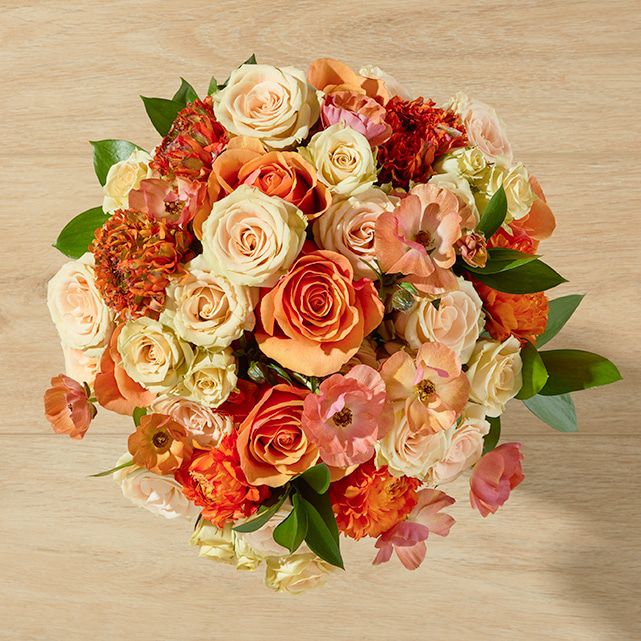 Bouquet Fleur d’Ambre – Roses Orange & Crème, Ranunculus – Bouquets.ma