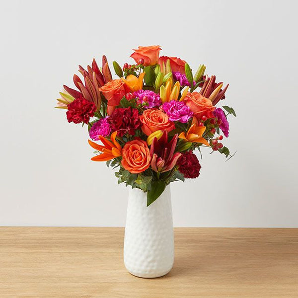 Bouquet Chaleur Dorée – Lys Orange & Roses Dorées – Bouquets.ma